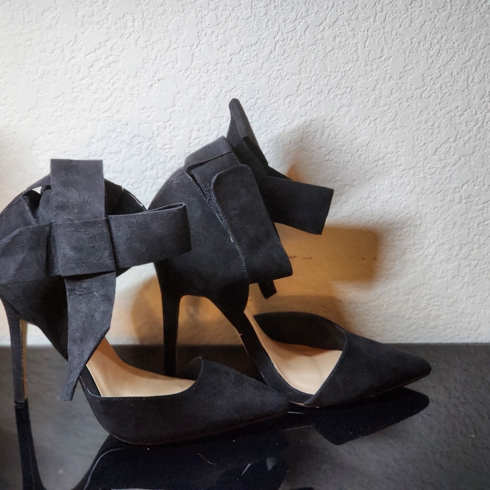 New with box worn once. Black suede high heels with bow on ankle size 10